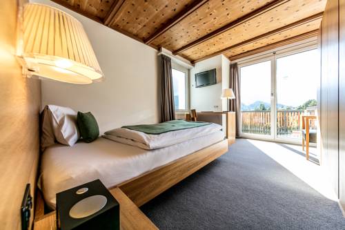 Imagen de la habitación del Hotel Engadiner Boutique-hotel Guardaval. Foto 15