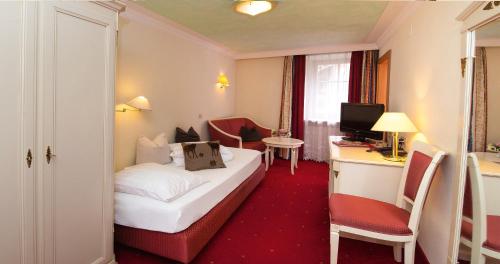 Imagen de la habitación del Hotel Engel, Sluderno. Foto 7