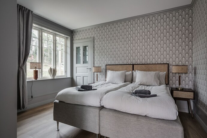 Imagen de la habitación del Hotel Engeltofta Sea Lodge. Foto 19