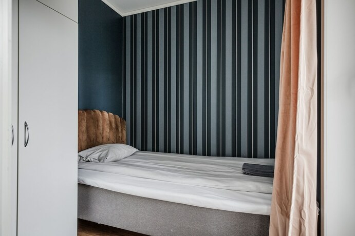 Imagen de la habitación del Hotel Engeltofta Sea Lodge. Foto 27