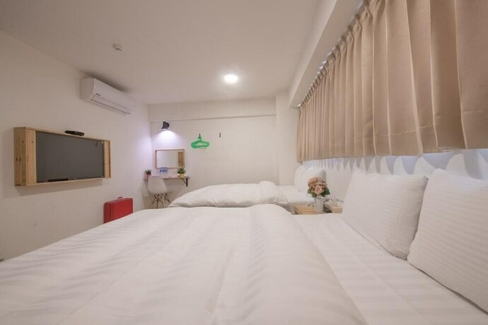 Imagen de la habitación del Hotel England Vacation. Foto 25