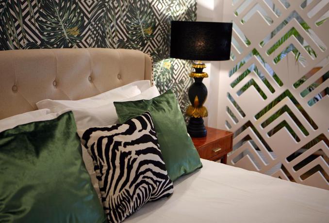 Imagen de la habitación del Hotel Engy Estoril - Luxury Villas. Foto 7