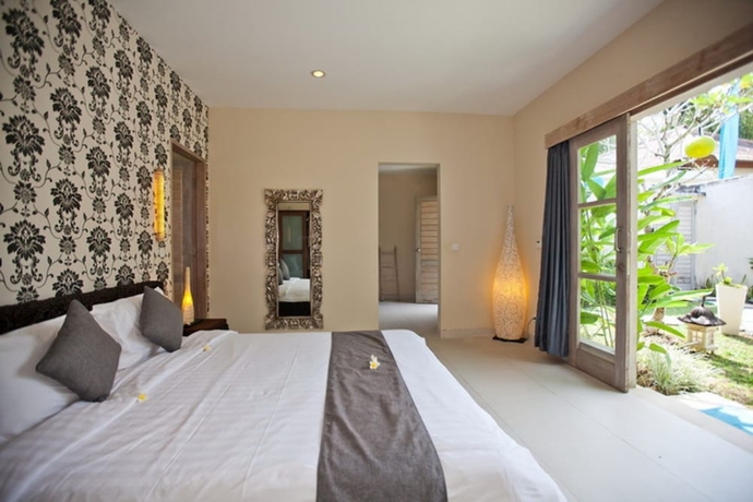 Imagen de la habitación del Hotel Enigma Bali Villas. Foto 4