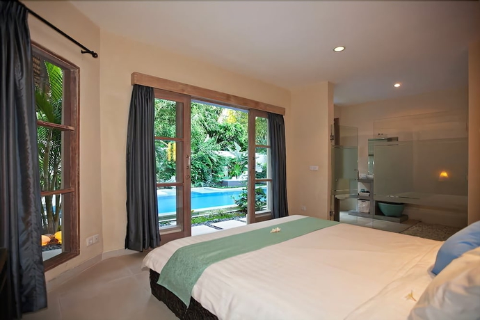 Imagen de la habitación del Hotel Enigma Bali Villas. Foto 6