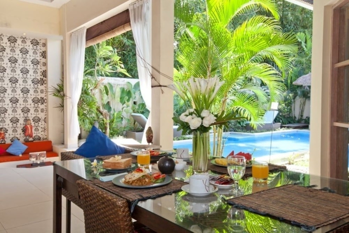 Imagen de la habitación del Hotel Enigma Bali Villas. Foto 9