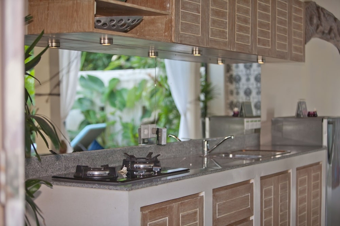 Imagen de la habitación del Hotel Enigma Bali Villas. Foto 10