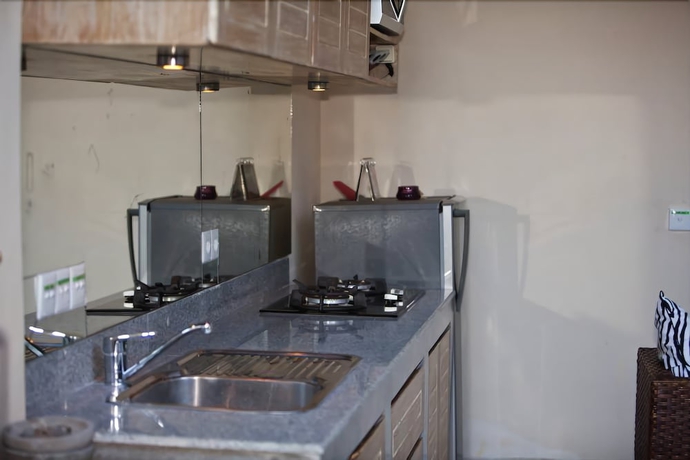 Imagen de la habitación del Hotel Enigma Bali Villas. Foto 11