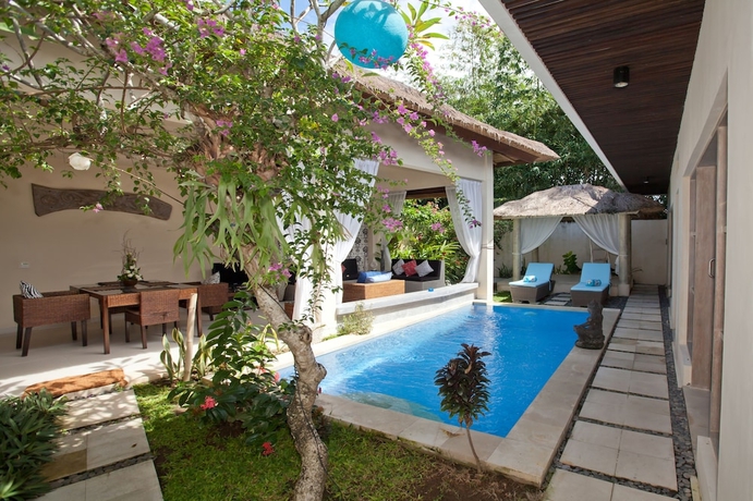 Imagen de la habitación del Hotel Enigma Bali Villas. Foto 16