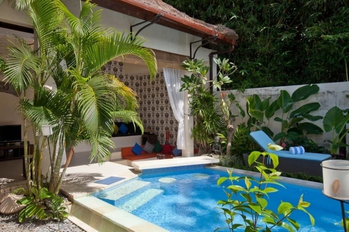 Imagen de la habitación del Hotel Enigma Bali Villas. Foto 19