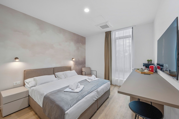 Imagen de la habitación del Hotel Enjoy Suites and Apartments. Foto 6
