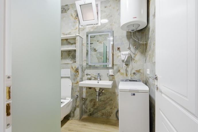 Imagen de la habitación del Hotel Enles Garden Beach Apartments. Foto 5