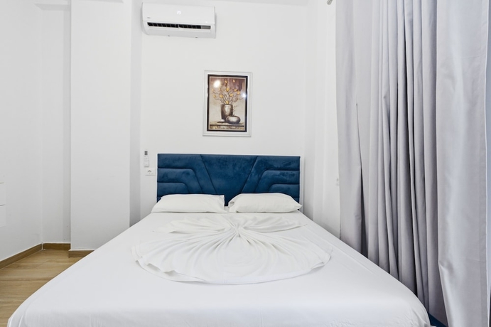 Imagen de la habitación del Hotel Enles Garden Beach Apartments. Foto 7