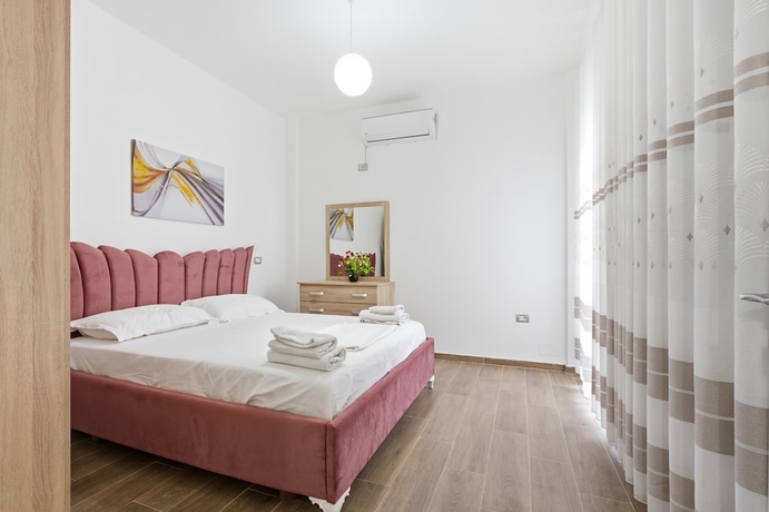 Imagen de la habitación del Hotel Enles Garden Beach Apartments. Foto 9