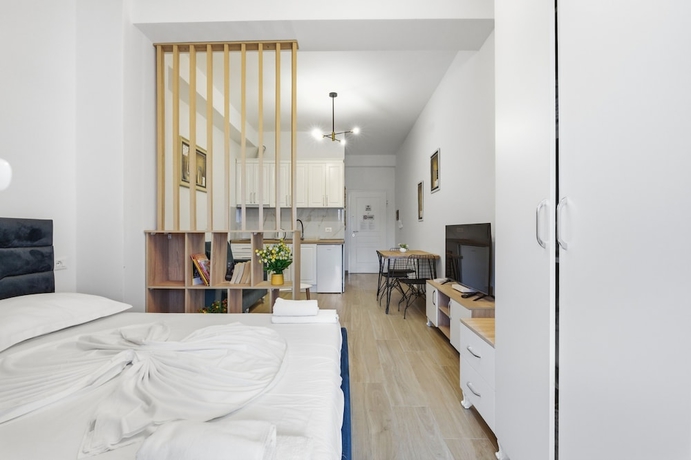 Imagen de la habitación del Hotel Enles Garden Beach Apartments. Foto 11