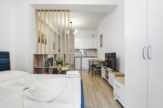 Imagen de la habitación del Hotel Enles Garden Beach Apartments. Foto 16
