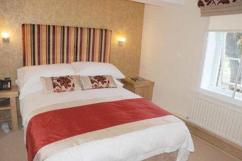 Imagen de la habitación del Hotel Ennios Boutique Rooms. Foto 8