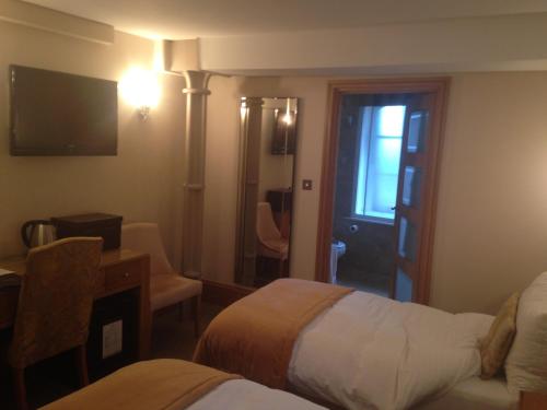 Imagen de la habitación del Hotel Ennios Boutique Rooms. Foto 9