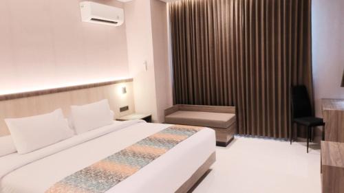 Imagen general del Hotel Eno Front One Semarang. Foto 7