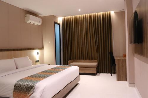 Imagen general del Hotel Eno Front One Semarang. Foto 8