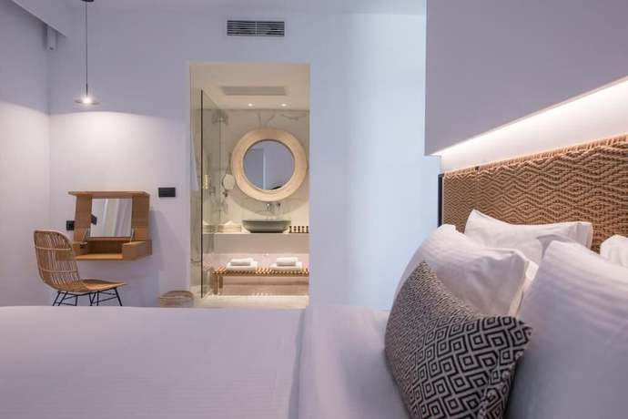 Imagen de la habitación del Hotel Enorme Ammos Beach. Foto 6