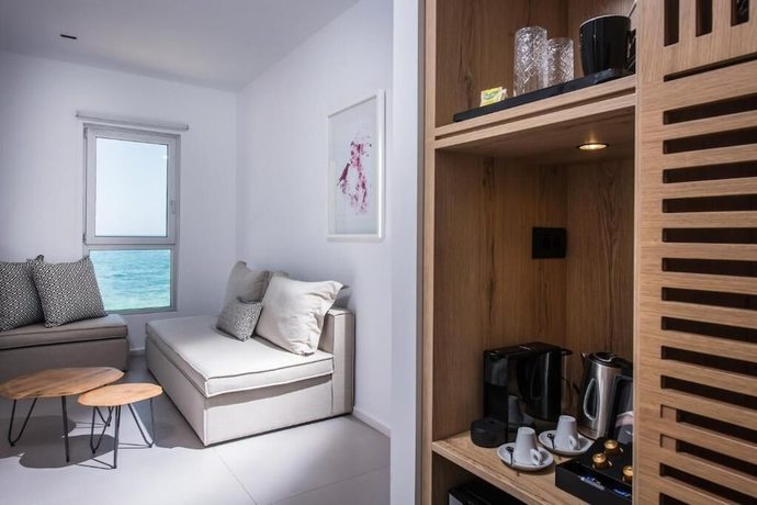 Imagen de la habitación del Hotel Enorme Ammos Beach. Foto 8