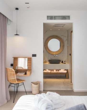 Imagen de la habitación del Hotel Enorme Ammos Beach. Foto 12