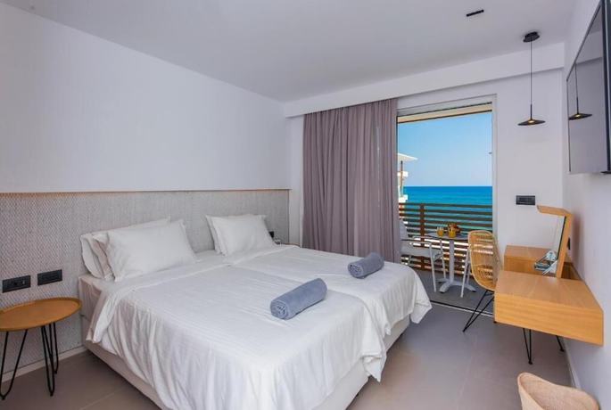 Imagen de la habitación del Hotel Enorme Ammos Beach. Foto 18