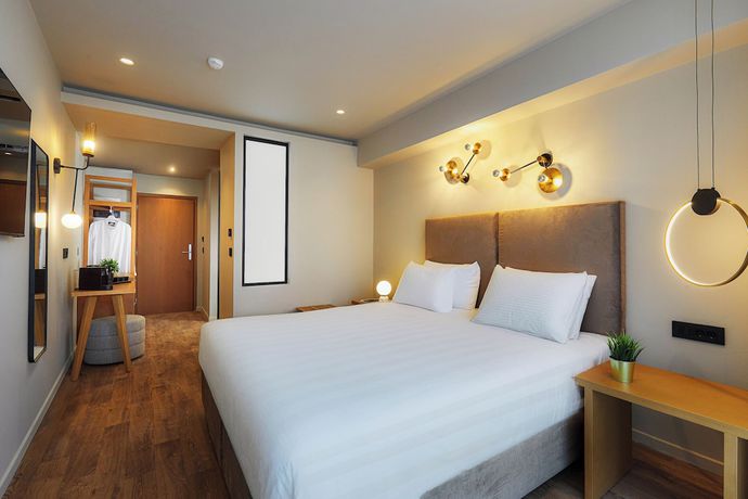 Imagen de la habitación del Hotel Enorme Epavli Urban Living. Foto 8