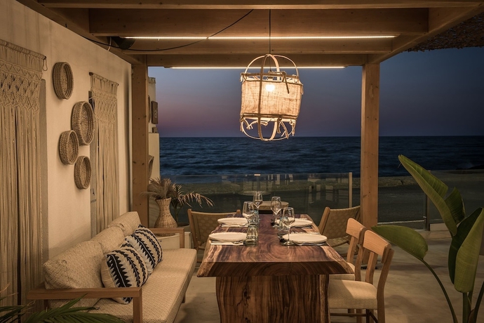 Imagen del bar/restaurante del Hotel Enorme Maya Beach - Adults Only. Foto 4