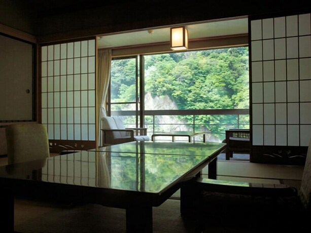 Imagen de la habitación del Hotel Enraku. Foto 24