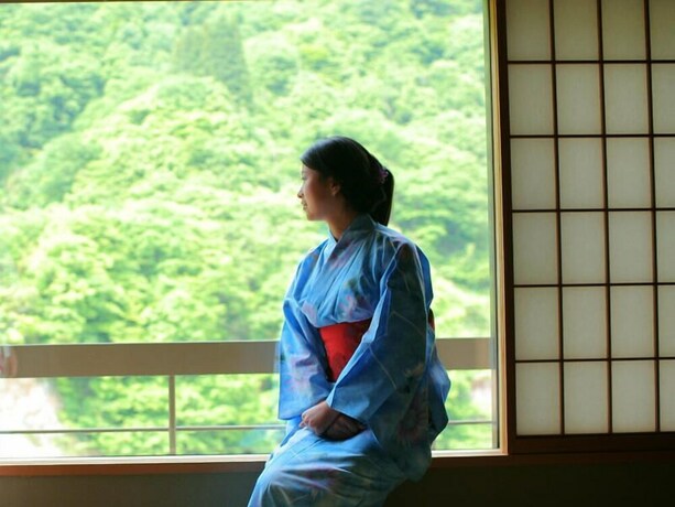 Imagen de la habitación del Hotel Enraku. Foto 29