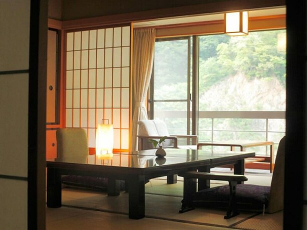 Imagen de la habitación del Hotel Enraku. Foto 33