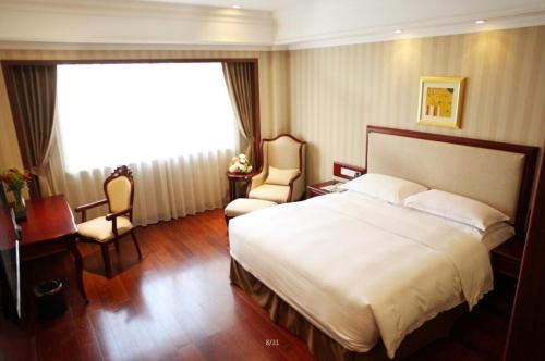 Imagen general del Hotel Enrichee Gloria Plaza Qingdao. Foto 3