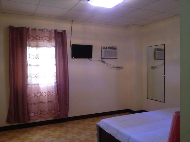 Imagen de la habitación del Hotel Enriquez, Balanga. Foto 3