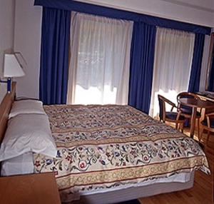 Imagen de la habitación del Hotel Enrosadira, Val di Fassa. Foto 4