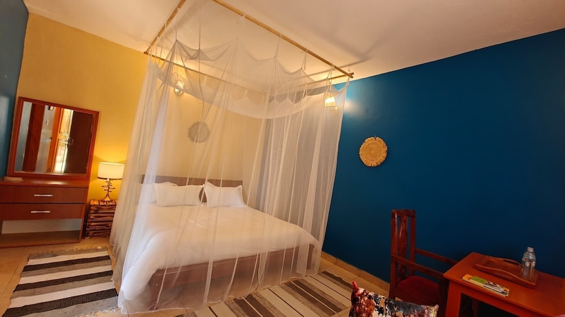 Imagen de la habitación del Hotel Entebbe Coffee Lodge. Foto 5