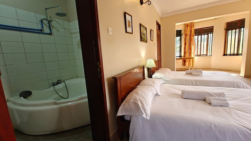 Imagen de la habitación del Hotel Entebbe Coffee Lodge. Foto 6