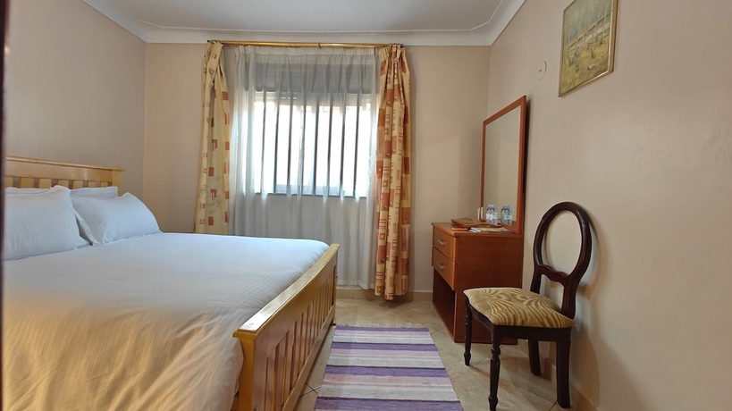 Imagen de la habitación del Hotel Entebbe Coffee Lodge. Foto 8