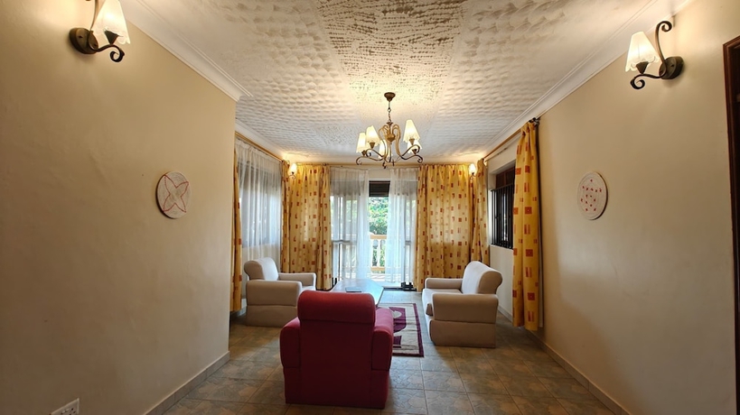 Imagen de la habitación del Hotel Entebbe Coffee Lodge. Foto 10