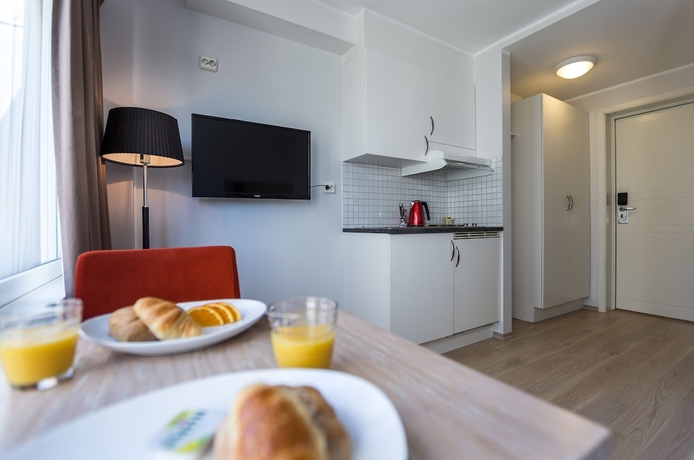 Imagen de la habitación del Hotel Enter City Apartment. Foto 5