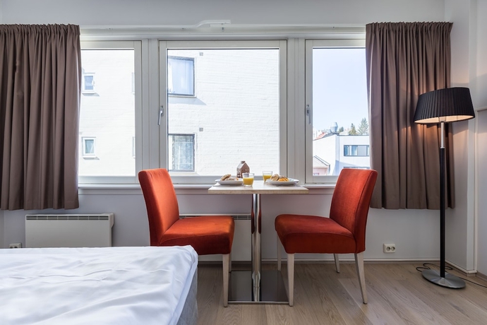 Imagen de la habitación del Hotel Enter City Apartment. Foto 6