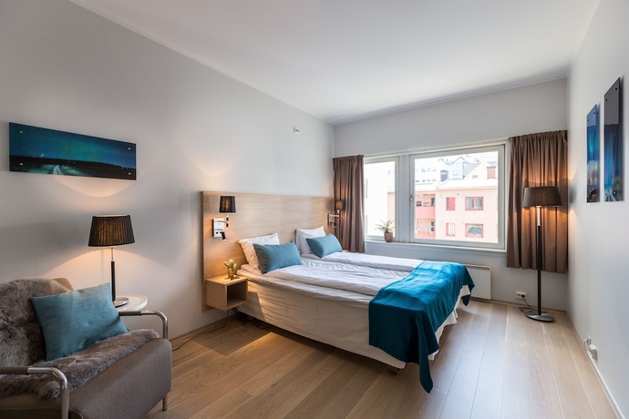 Imagen de la habitación del Hotel Enter City Apartment. Foto 11