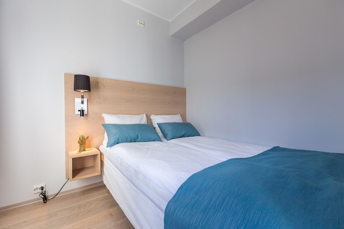 Imagen de la habitación del Hotel Enter City Apartment. Foto 14