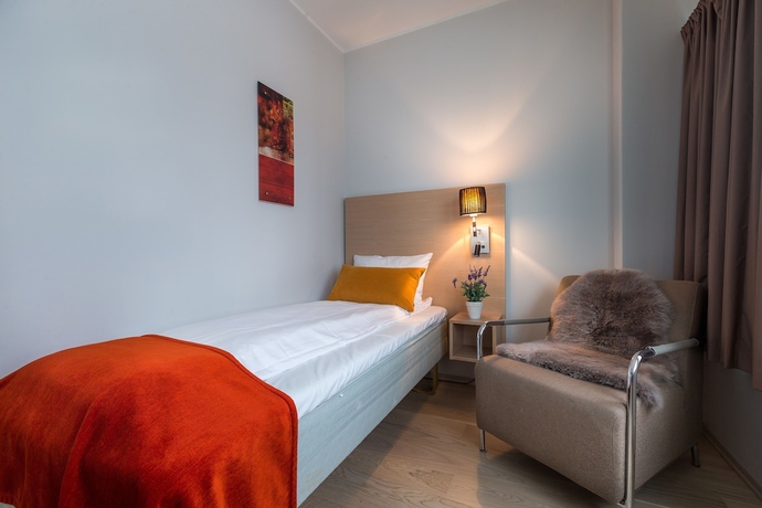 Imagen de la habitación del Hotel Enter City Apartment. Foto 15