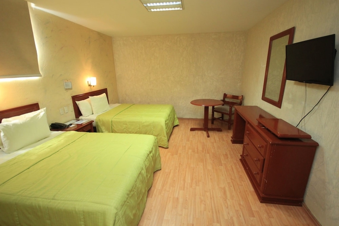 Imagen de la habitación del Hotel Enterprise Inn Plaza. Foto 2