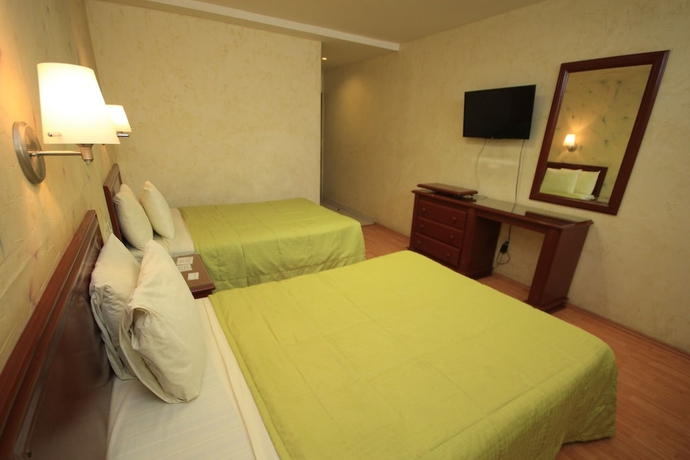 Imagen de la habitación del Hotel Enterprise Inn Plaza. Foto 3