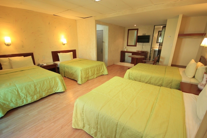 Imagen de la habitación del Hotel Enterprise Inn Plaza. Foto 4