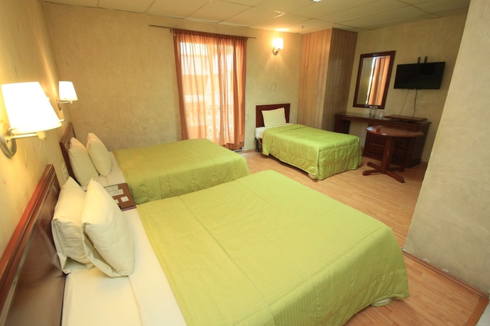 Imagen de la habitación del Hotel Enterprise Inn Plaza. Foto 6