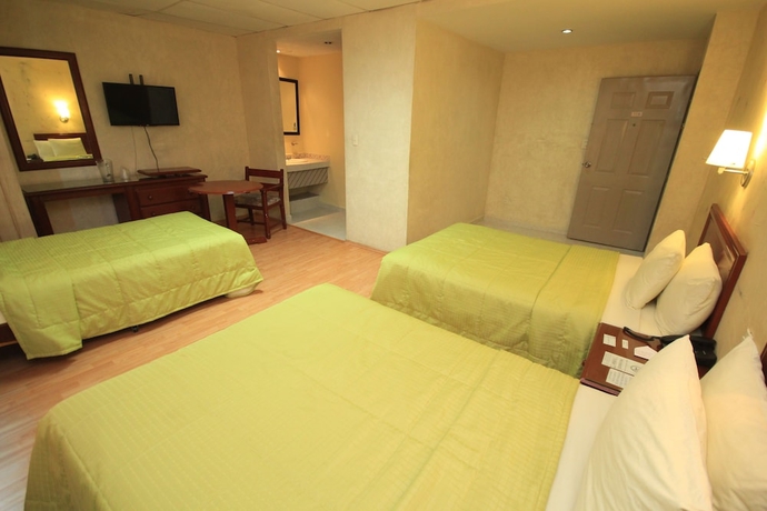 Imagen de la habitación del Hotel Enterprise Inn Plaza. Foto 7