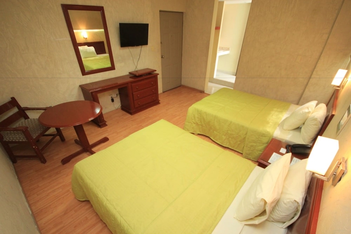 Imagen de la habitación del Hotel Enterprise Inn Plaza. Foto 9